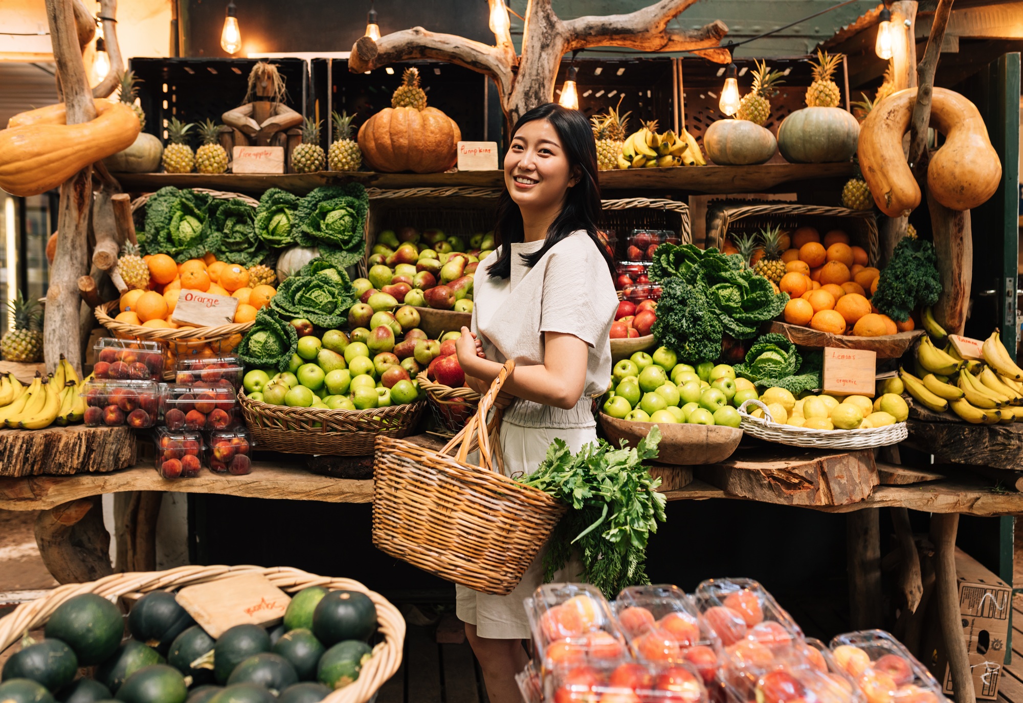 Smiling female buying organic food.