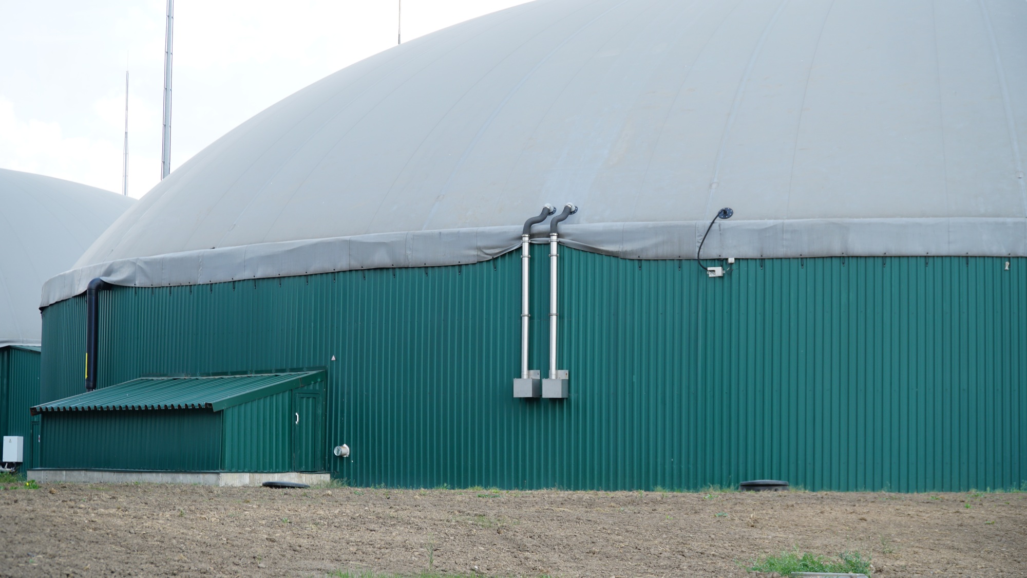 Biogas. Modern bio comlex. Renewable energy from biomass. Innovative biogas plant among green nature