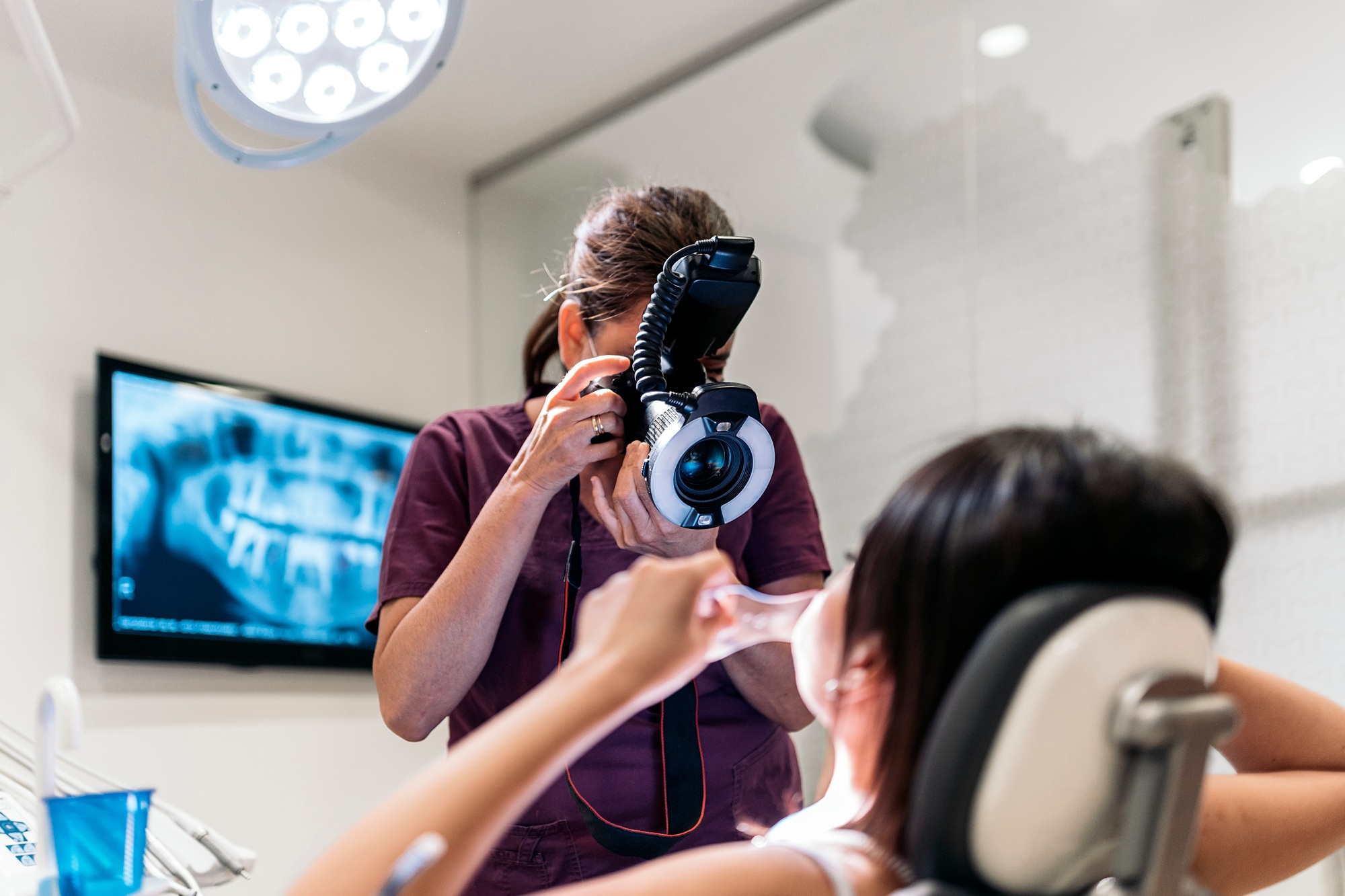Female Young Dentist Taking Picture